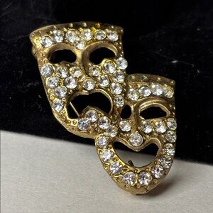 Gold Tone Drama Mask Brooch with Clear White Crystals Costume Jewelry